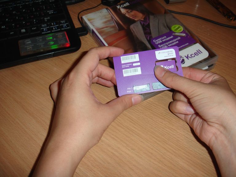 Симкарта для модема. Сим карта Ucell. Фиолетовая сим карта. USB Modem Ucell. Сим карты в коробке.