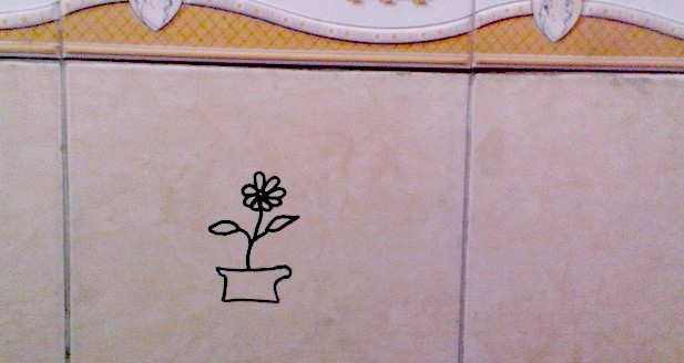 Изображение цветка на стенке туалета (Алматы)